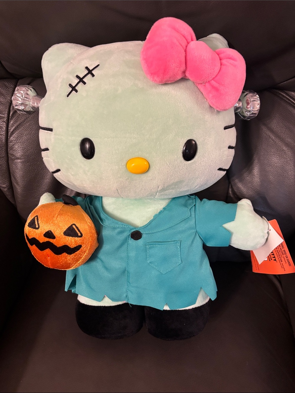 Hello Kitty Green Frankenstein Plush Costume with Pink Bow and Orange Pumpkin
